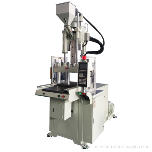 Vertical injection machine for electronics